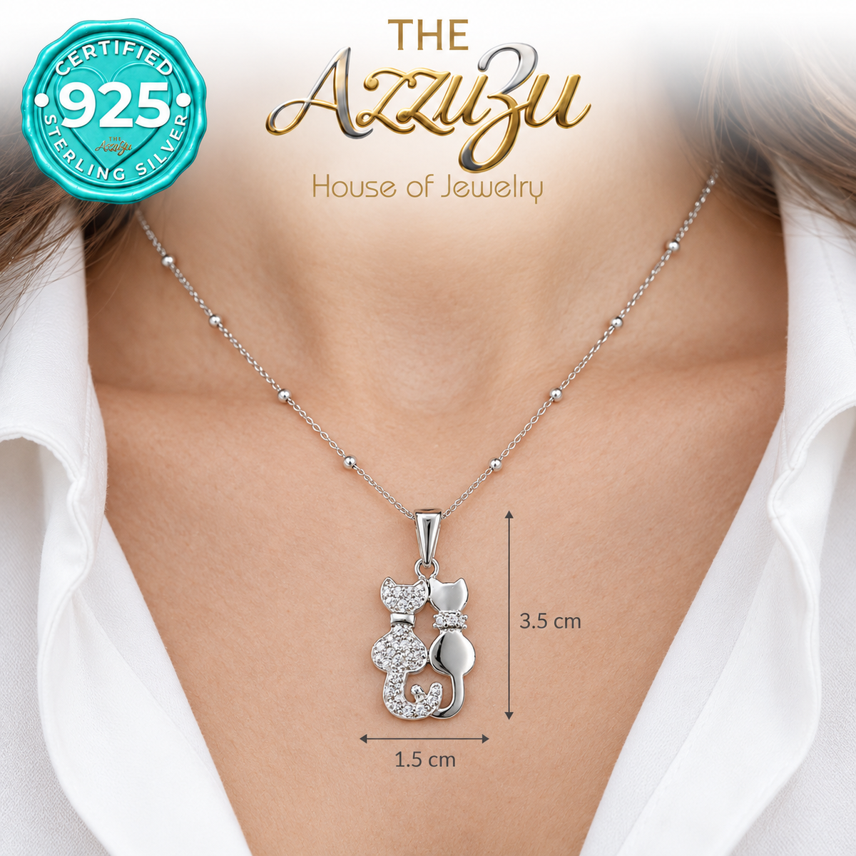 The AzzuZu Two Cats Zirconia Pendant in .925 Sterling Silver